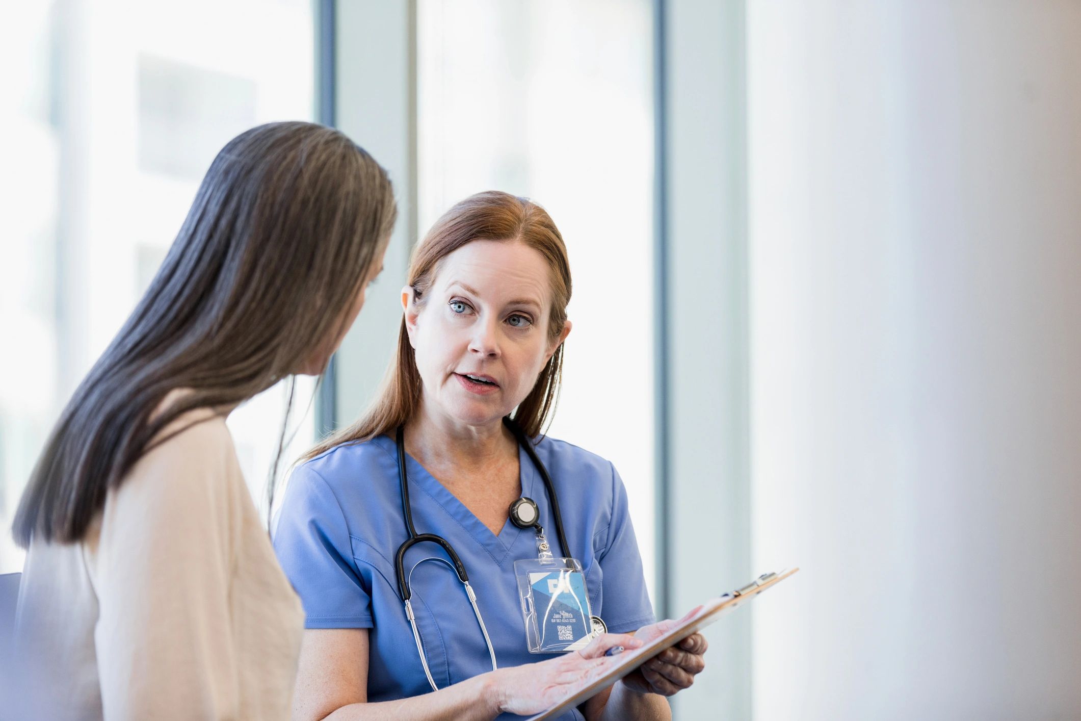 Doctor speaking with a patient during a consultation