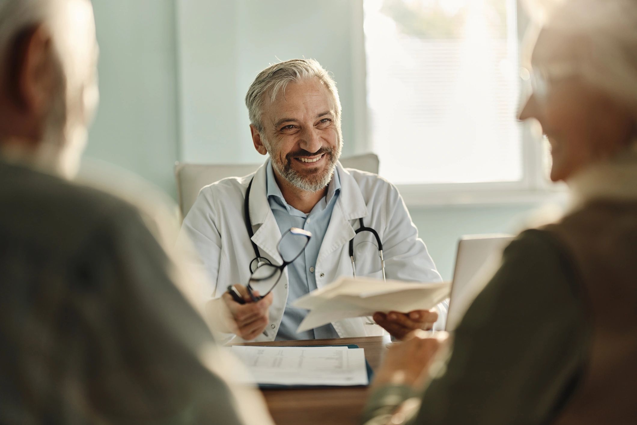 Doctor meeting with patients during an office appointment